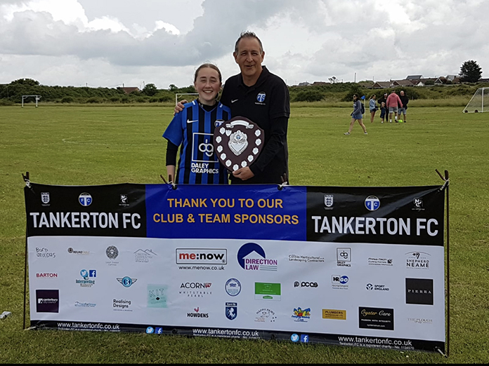 Club Chairman, Dave McGovarin, presents the Adam Bowey shield to U18s Girls' captain, Sophie, in recognition of the team's fantastic achievement in winning the delayed final of the U16s' Kent County Cup