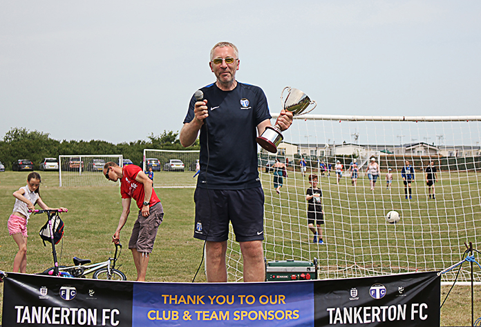 Under 10s' coach, Jamie Clark with the TFC Manager of the Season Trophy