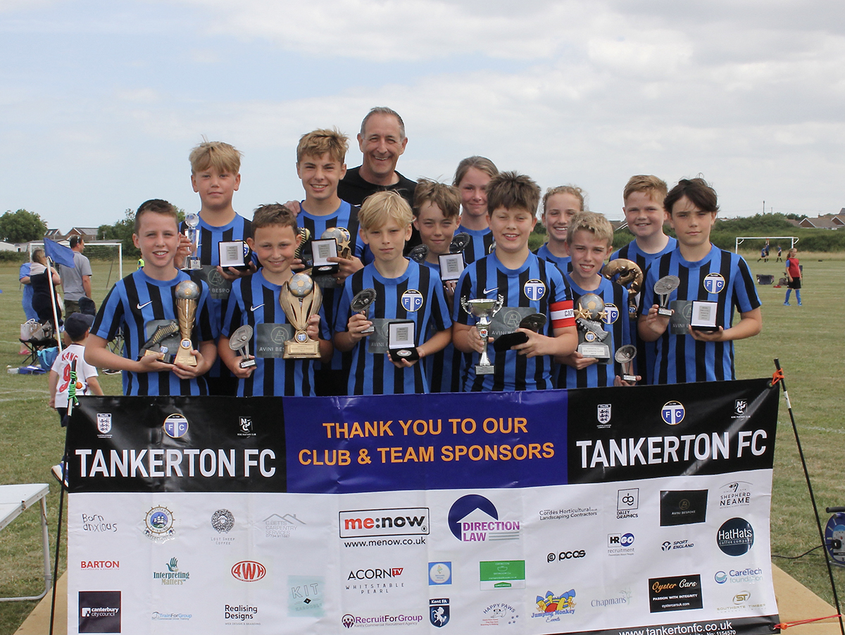 Under 12s Lions with their trophies