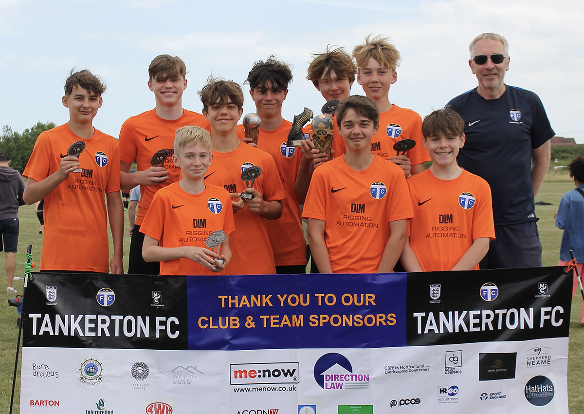 Under 14s with their trophies